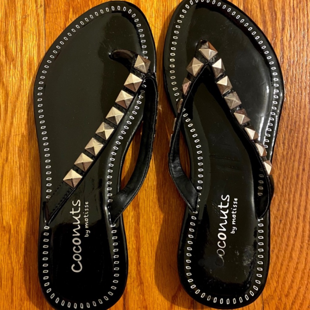 Black studded flip flops